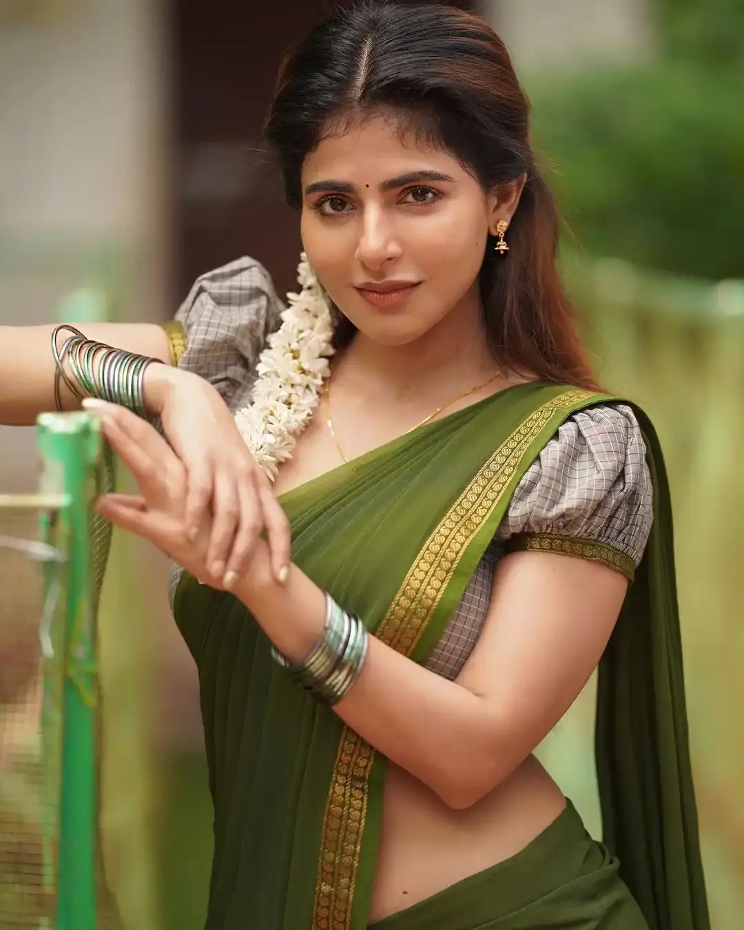 iswarya menon sankranthi special traditional green half saree photos